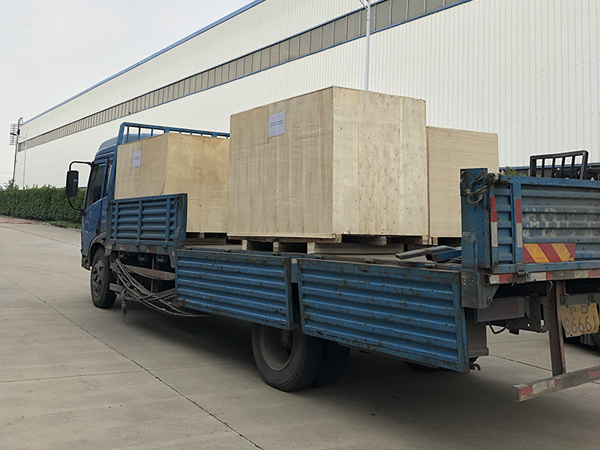 Wooden crate delivered by truck
